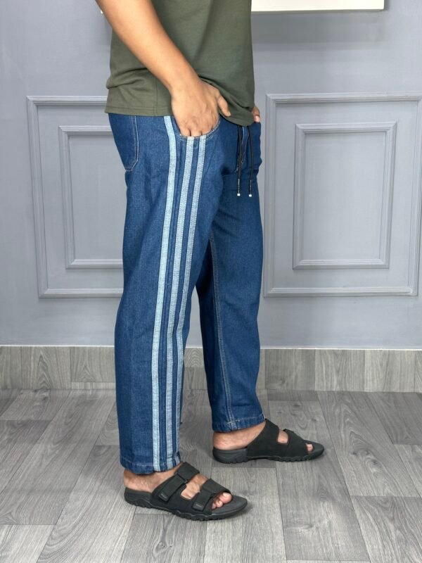 STRIPE DENIM TROUSERS.
